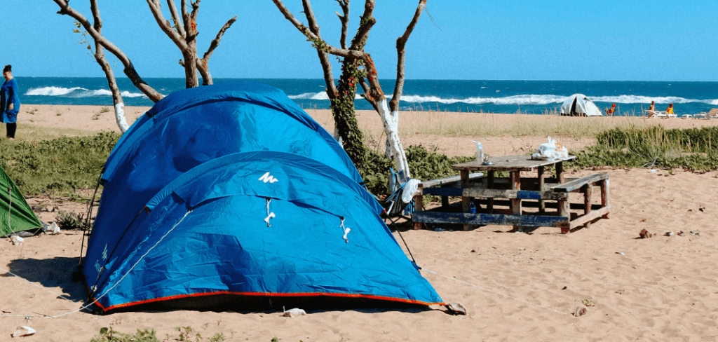 using a camping tent at the beach